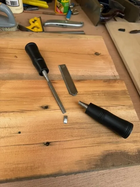 A broken, cheap tool, illustrating the importance of quality tools.