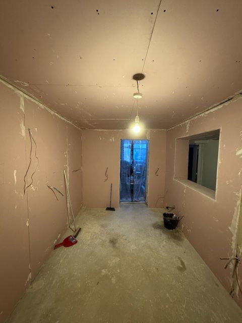 plasterboard up on the walls and ceiling