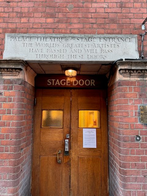 The stage door with an inscription above in the stone saying "Palace Theatre Stage Entrance. The World's greatest artists have passed and will pass through these doors."