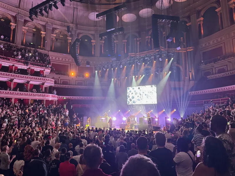 Wide shot of the hall with the band on stage